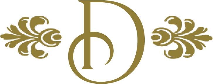 Stylized gold letter D with decorative floral motifs on each side.